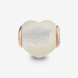 If you love handcrafted jewelry that is uniquely created, My Reminder charm is your best choice. A heart shape bead that represents kindness, and caring for each other. A reminder of happy days together that will never fade, always be beside and inside you. Suitable as gift ideas to give to your special someone on very special occasions. My Reminder charm is made from Mother of Pearl of the large bezel, diameter 1 foot, can be made only 1 piece. 12 mm thick, giving a natural glow with Sterling Silver through 2-micron plating. *** Note: Charm made from natural Mother Of Pearl, colors, and patterns will vary from each Charm ****